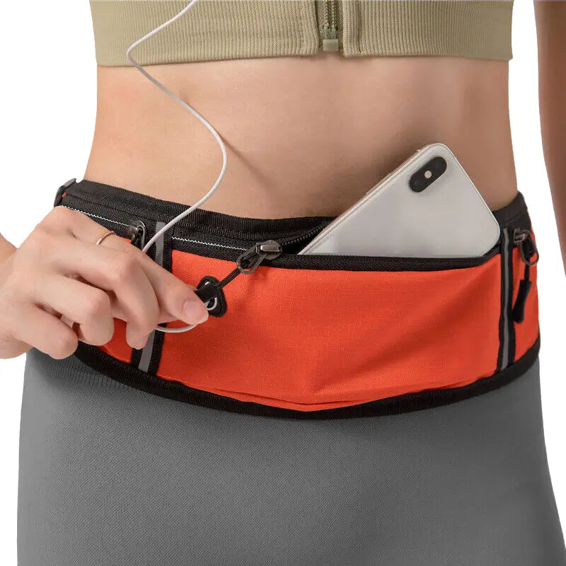 Femme qui porte à la taille un petit sac banane pour le sport pour courir de couleur orange __switch:Orange