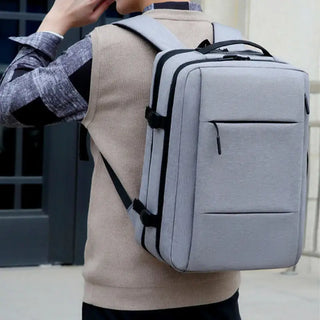 Grand sac à dos gris de voyage étanche pour homme et ordinateur