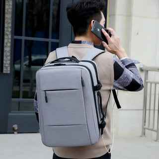 Grand sac à dos gris de voyage étanche pour homme et ordinateur