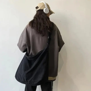 Grand sac banane XXL noir à bandoulière et en toile pour femme